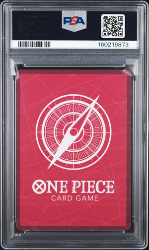 A PSA graded One Piece Card Game deck box featuring a red sleeve with a white compass design and the text 'ONE PIECE CARD GAME' on a clear plastic grading case.